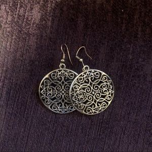 Gold circle earrings with designs